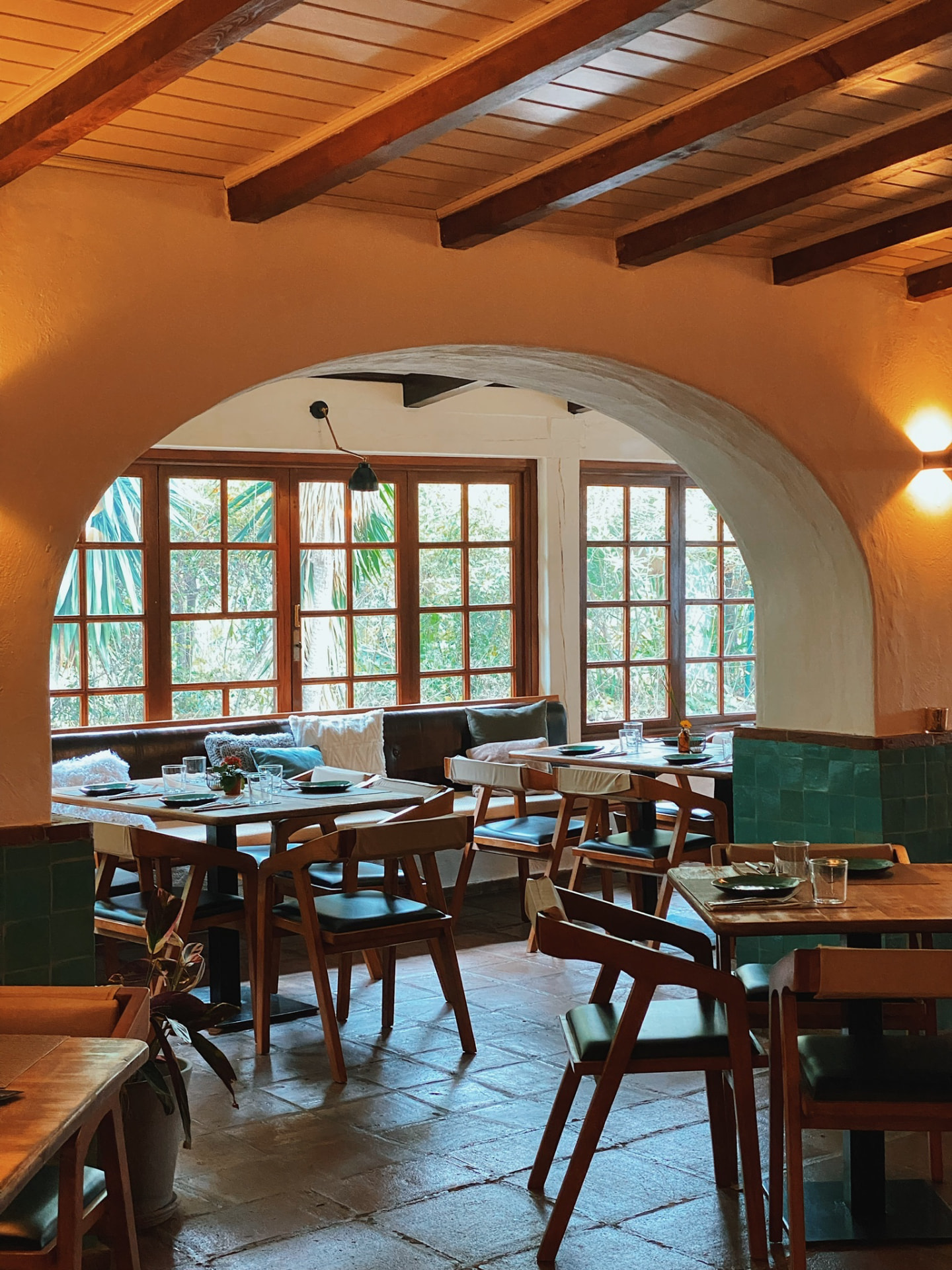 Cascada's indoor dining room set with long tables for a group dinner